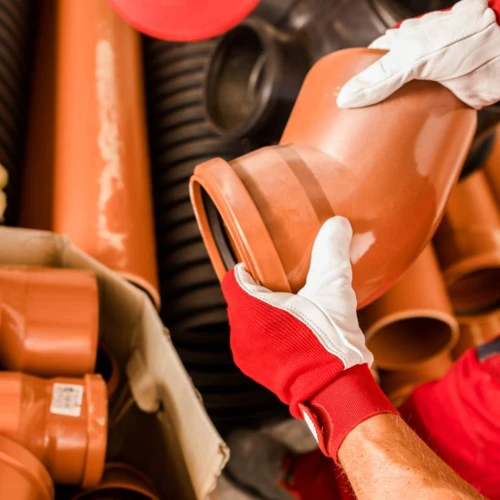 plumbing-worker-with-plastic